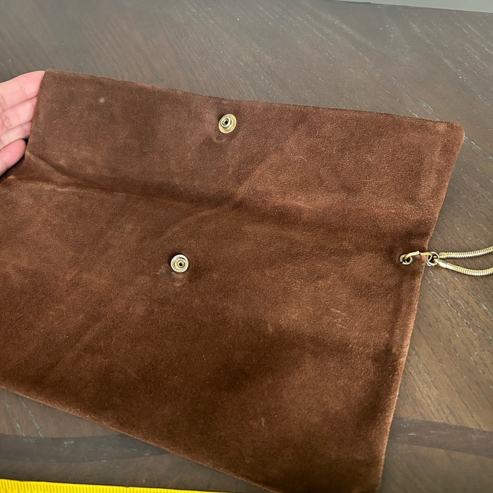 Brown leather clutch with minimalist gold-tone details and gold chain wristlet - Picture 13 of 14